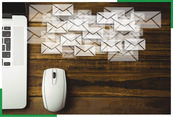 Laptop and flying email icons representing offshore email marketing services and targeted campaigns USA