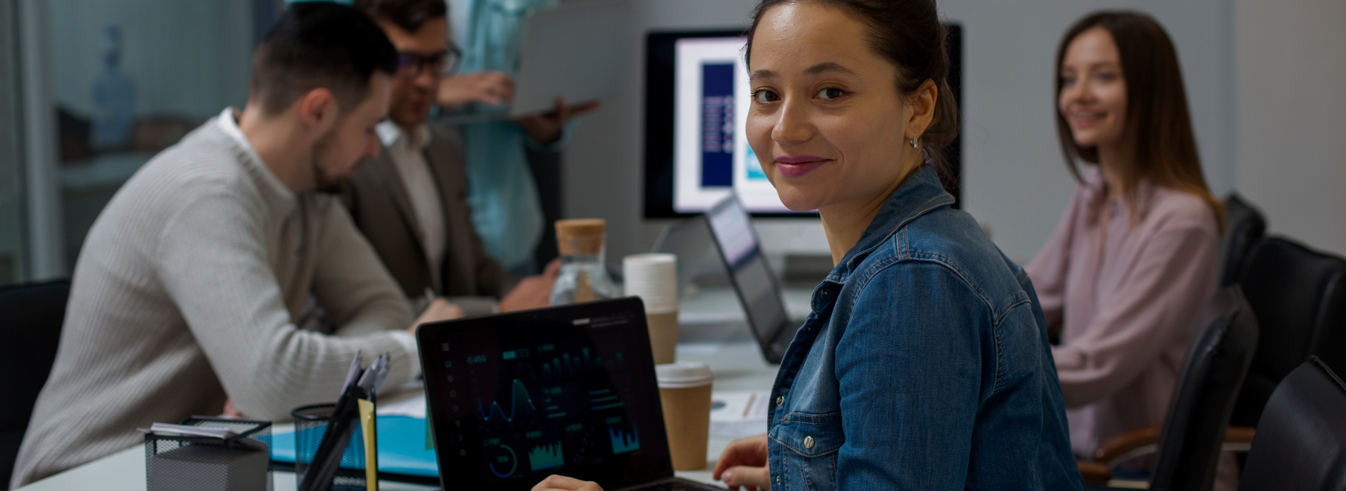 IT professionals working with data analytics and dashboards representing offshore IT services and support USA