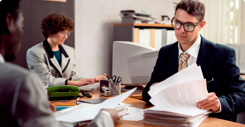 Legal experts reviewing documents representing fully supported offshore legal administration solutions USA