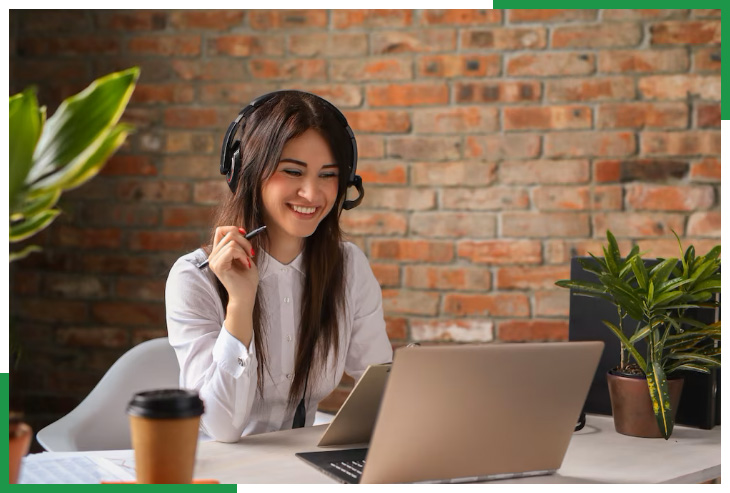 Professional handling customer support via laptop, showcasing IT outsourcing and offshore team USA